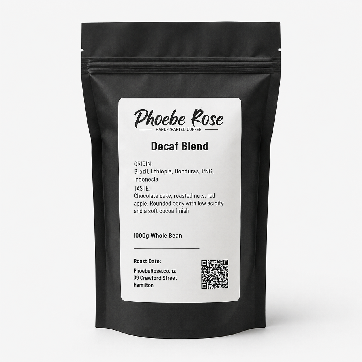 A black stand-up coffee bag with a large white label reading 'Phoebe Rose Decaf Blend' on a light gray background.
